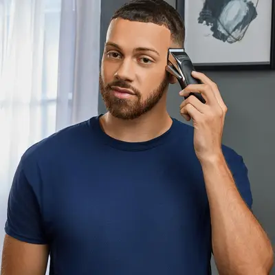 Remington Stylist Hair Clipper HC363C - Masina de tuns kit 20 piese (8 piepteni 3-25mm, foarfece, pelerina, perie gat, clame, husa), lame ceramice autoascutire, cord/cordless, 40 min